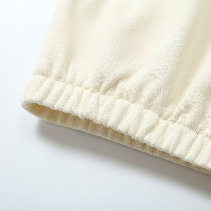 Women’s oversized pullover with half zip stand collar, elastic hem, and drop shoulders Mune Fashion