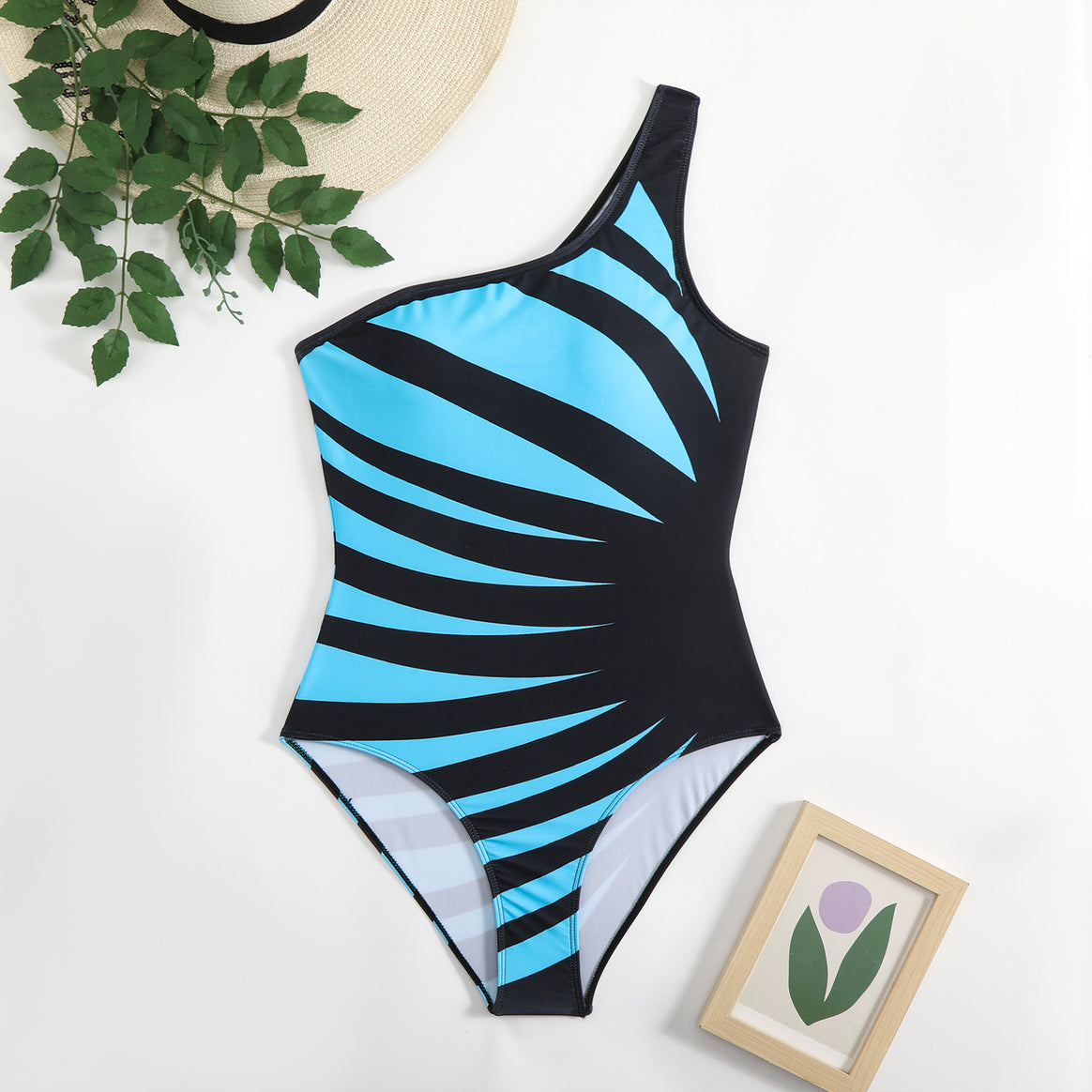 Women's One-Piece Swimsuit with Asymmetrical Design and Trendy Graphic Pattern Mune Fashion