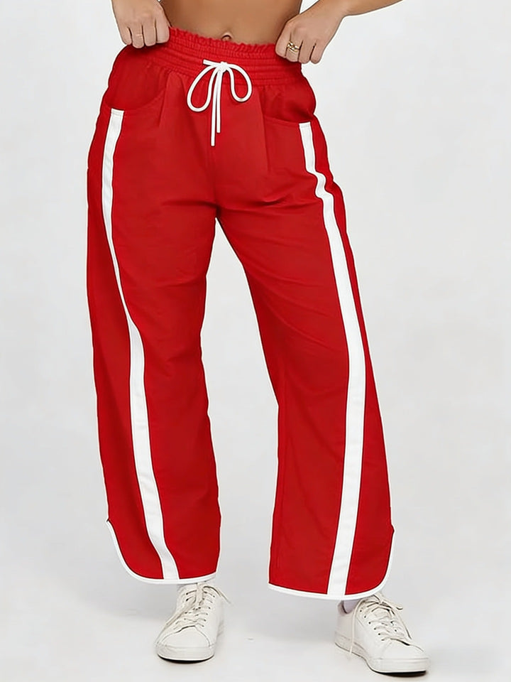 Women's nan relaxed track pants with side contrast stripe, elastic smocked waistband, and side pockets Mune Fashion