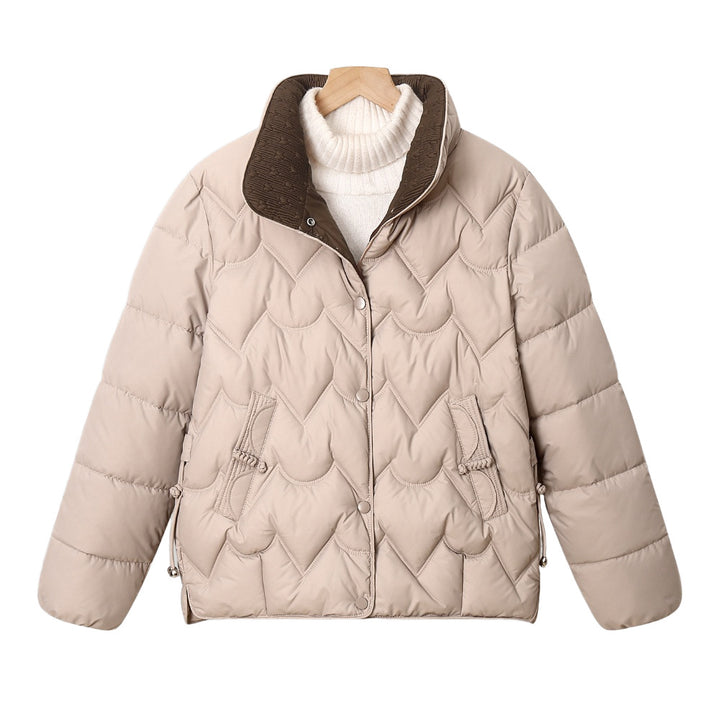 Women's short quilted puffer jacket with decorative curved quilting and snap button placket Mune Fashion