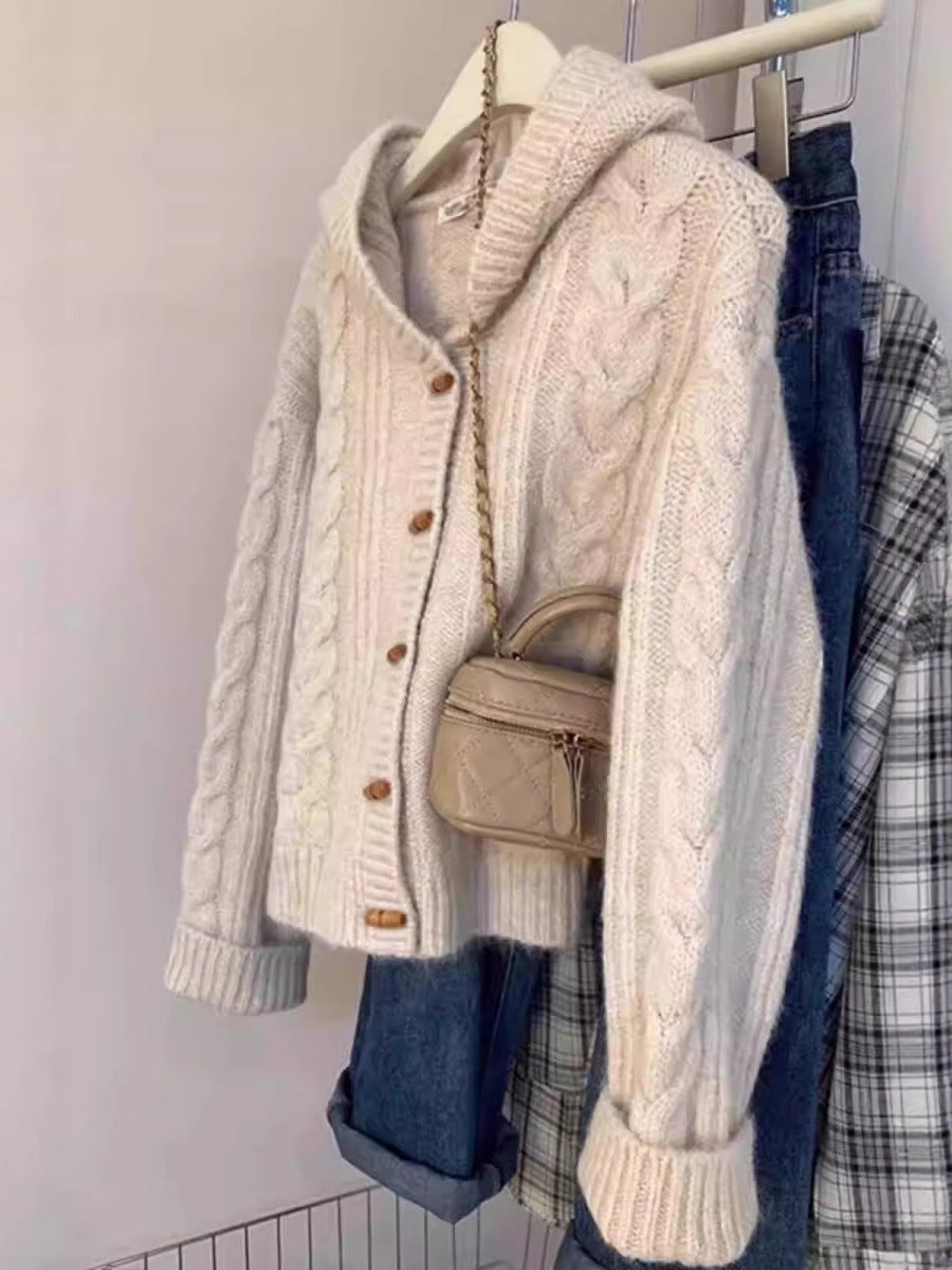 Women's hooded cardigan with cable knit, wooden button placket, and boxy silhouette Mune Fashion
