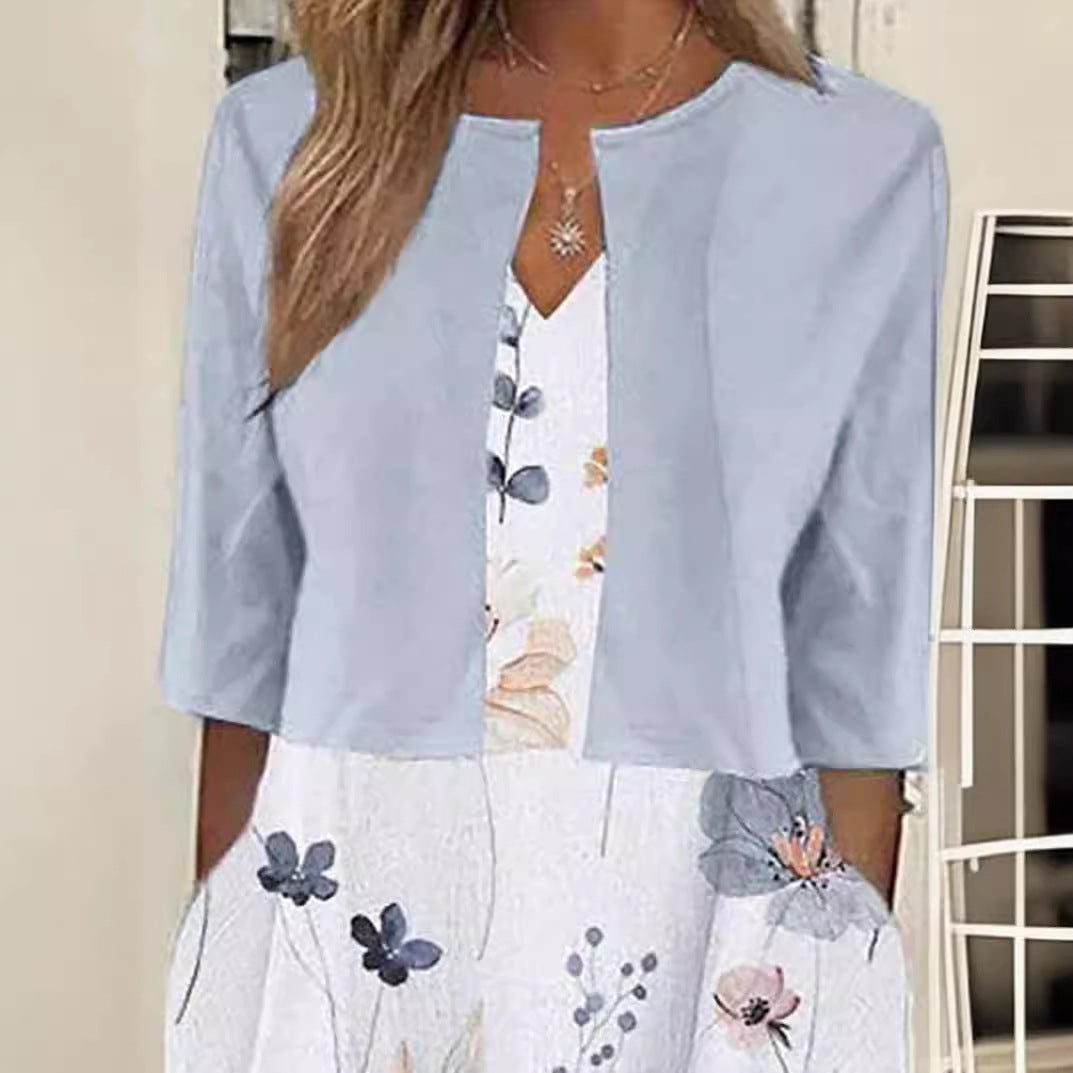 Women's maxi dress with separate bolero, V-neck, inset pockets, and floral A-line silhouette Mune Fashion