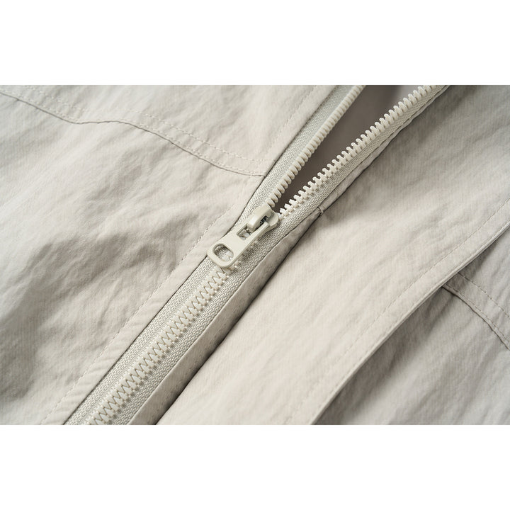 Unisex Short Jacket in minimalist Workwear look with high stand-up collar and snap button closure Mune Fashion