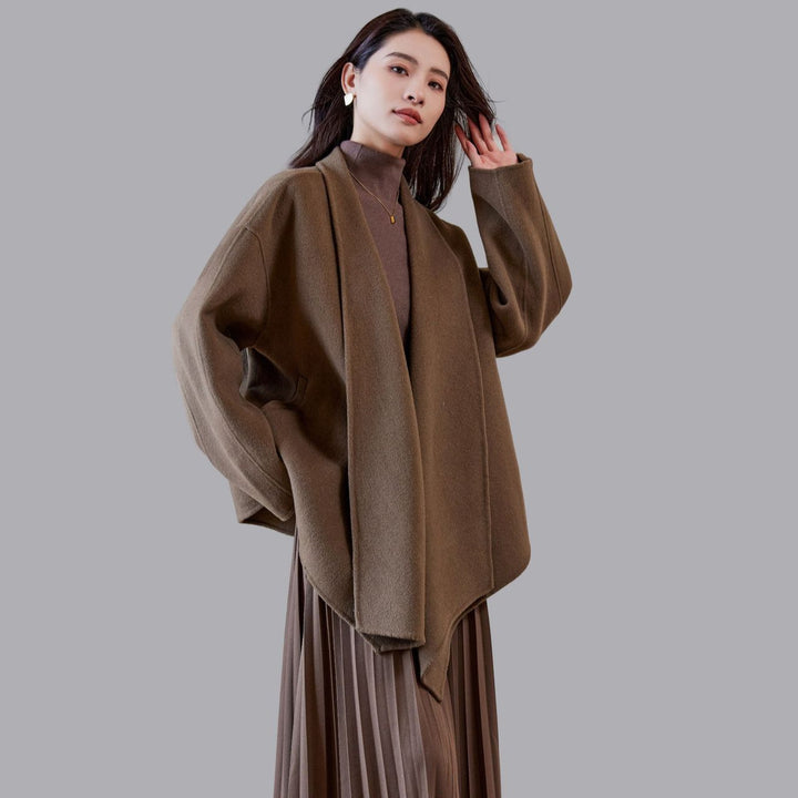 Women's oversized coat made from wool blend with open shawl collar and asymmetrical hem Mune Fashion