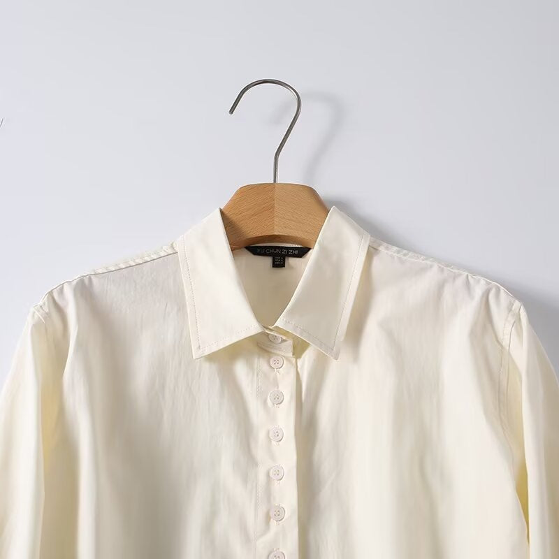 Women loose-fitting shirt blouse made of flowing material with continuous button placket Mune Fashion
