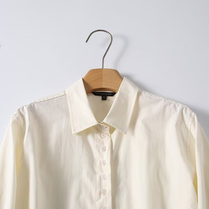 Women loose-fitting shirt blouse made of flowing material with continuous button placket Mune Fashion