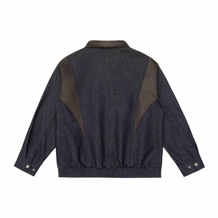 Men's short jacket in boxy cut made of wool-denim mix with leather-trimmed collar and vertical zippered chest pocket Mune Fashion