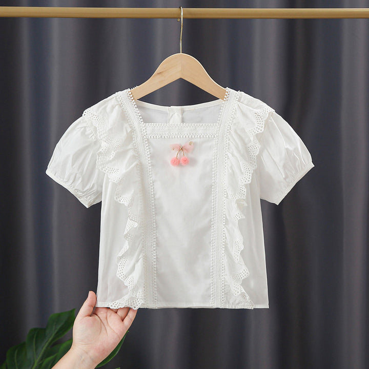 Girls blouse with playful ruffle design and artistic crochet decoration Mune Fashion