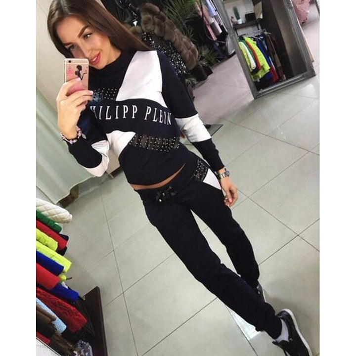 Women's sporty tracksuit set with studded detailing and color block design Mune Fashion