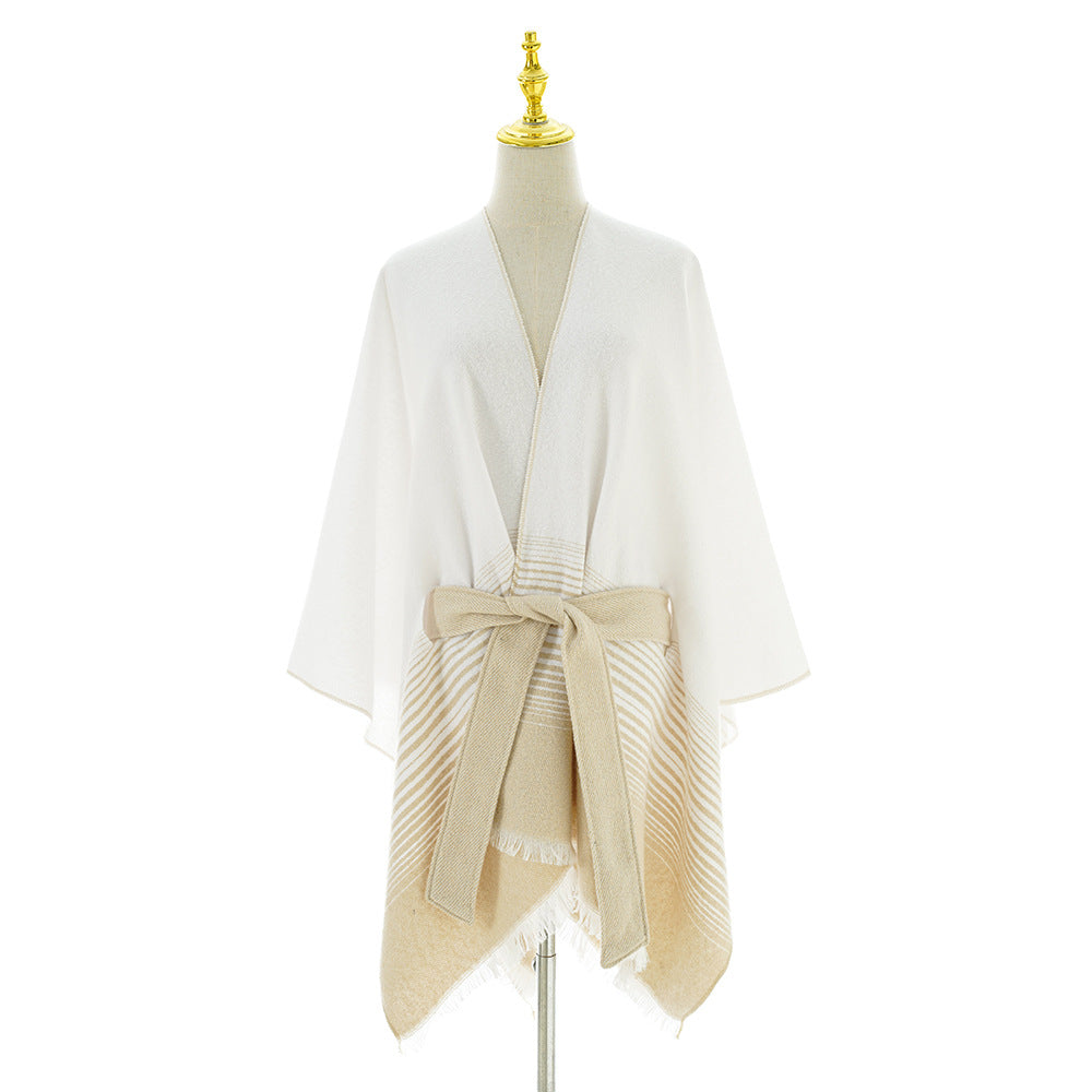 Ladies wrap poncho made of fine knit with tie belt and fringed hem Mune Fashion