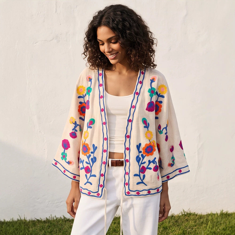 Women embroidered linen wrap jacket with folkloric flower appliqués Mune Fashion