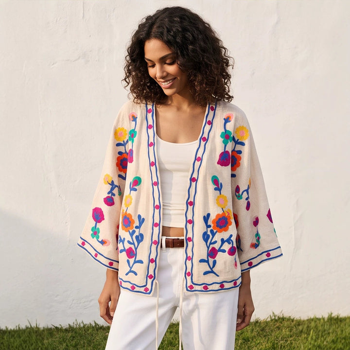 Women embroidered linen wrap jacket with folkloric flower appliqués Mune Fashion