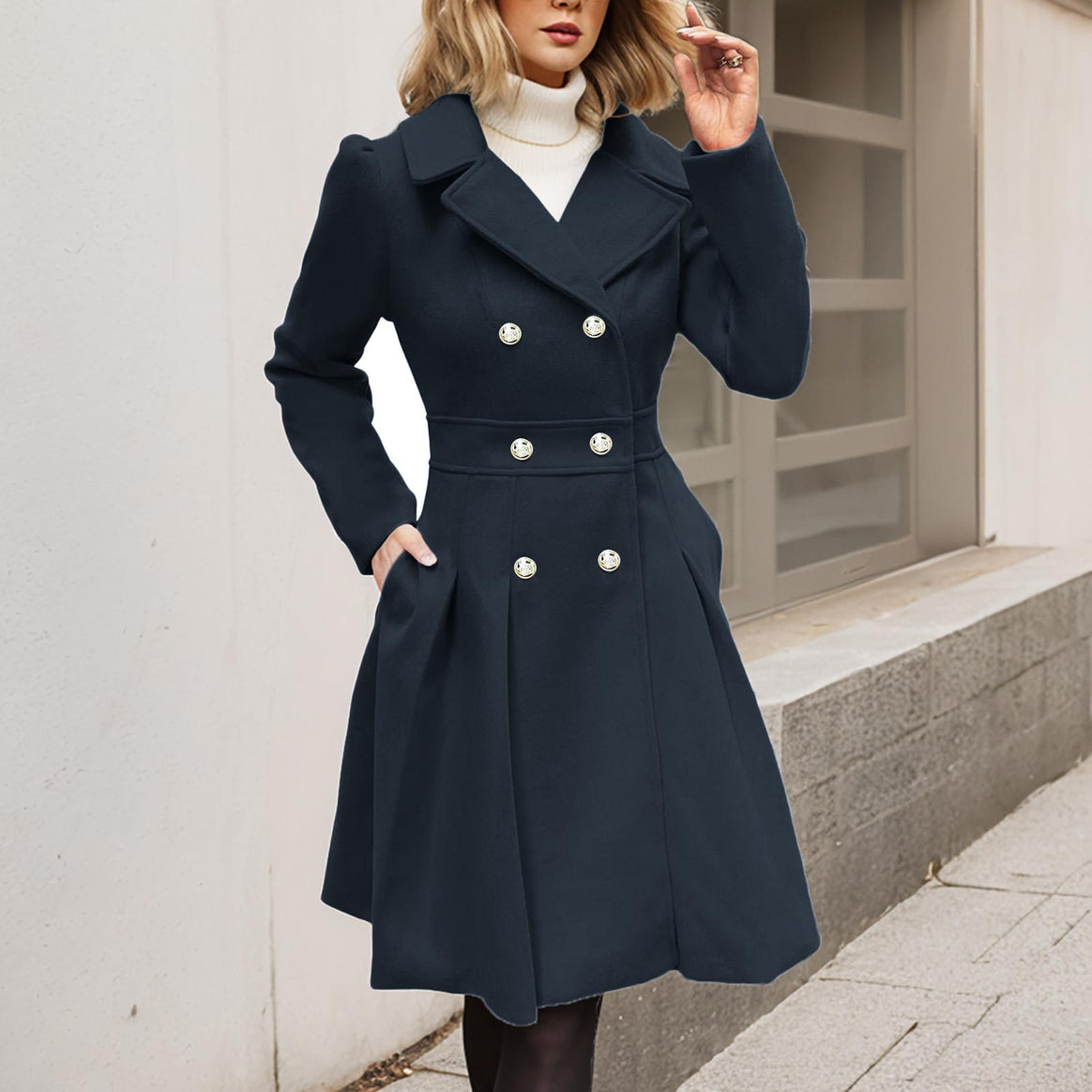 Women's fitted balloon coat with double-breasted front, flared skirt section and decorative buttons Mune Fashion