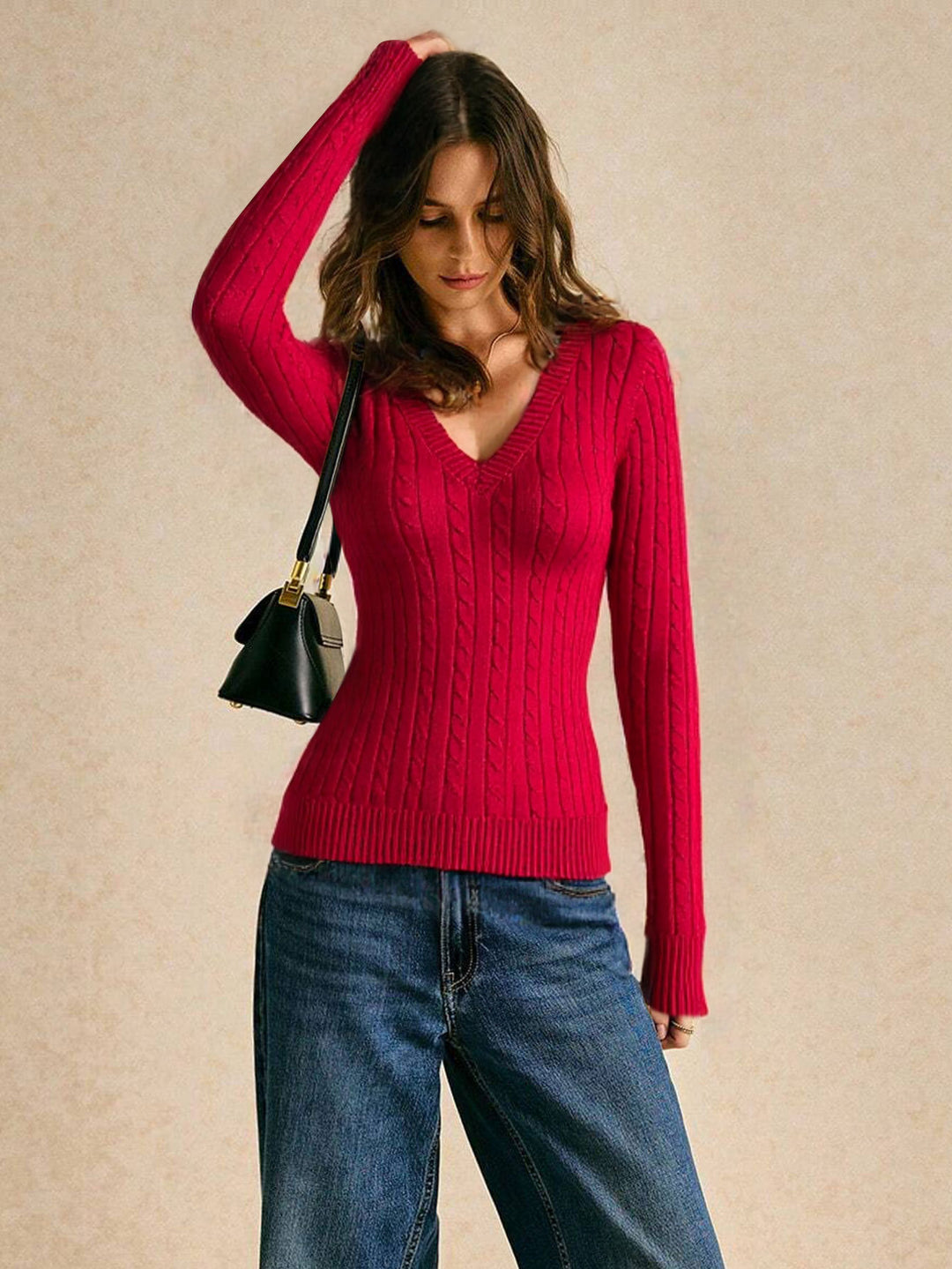 Women's fitted cable knit pullover with V-neck and tailored ribbed structure