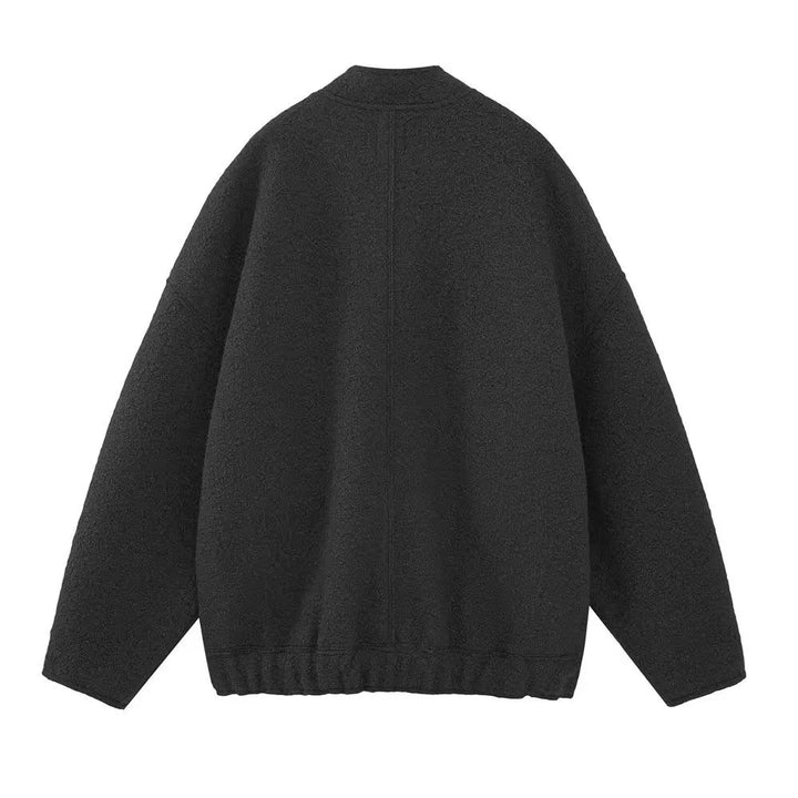Women's short boxy wool blend jacket with short stand-up collar, concealed front placket and patch pockets Mune Fashion