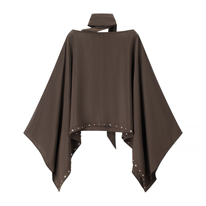 Women’s flowing cape poncho with bow, asymmetrical pointed hem and eyelet trim Mune Fashion