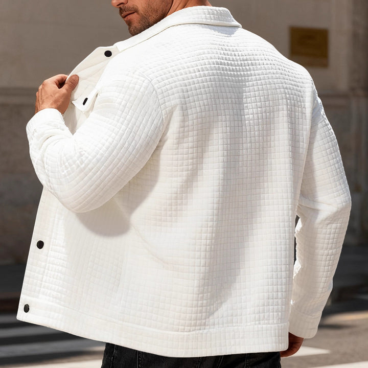 Men's quilted shirt jacket in overshirt style with snap button placket and applied chest flaps Mune Fashion