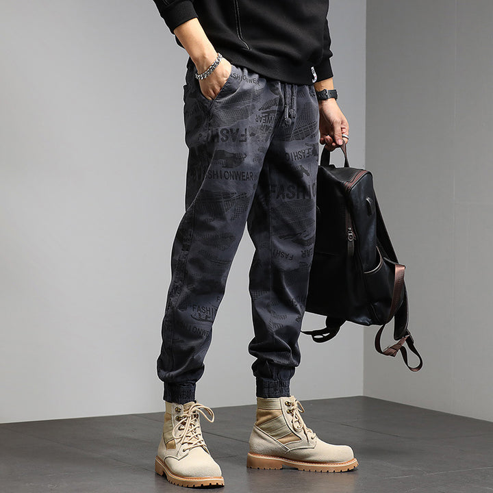 Herren Camouflage-Joggerhose mit Tunnelzug, elastischen Bündchen und Statement-Prints Mune Fashion