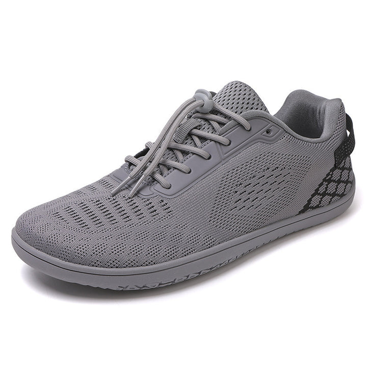 Unisex barefoot-inspired knitted sneaker with elastic fit, quick pull cord, and grippy full rubber sole Mune Fashion