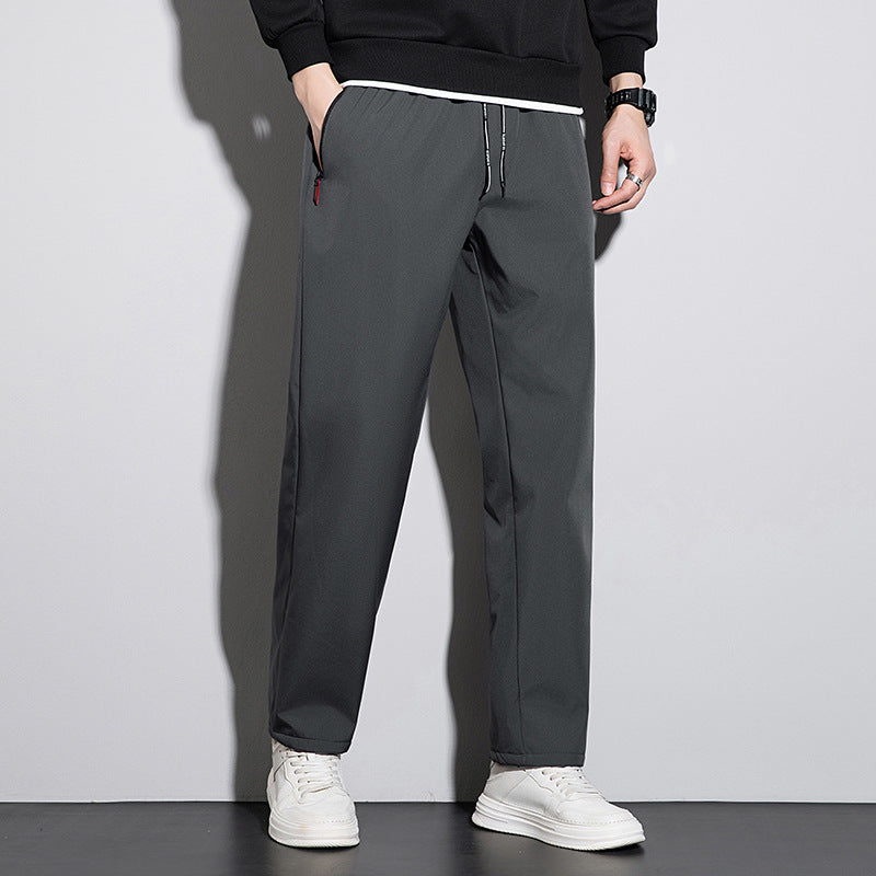 Men's straight-cut leisure and jogging pants with elastic waistband, drawstring, and secure zipper pockets Mune Fashion