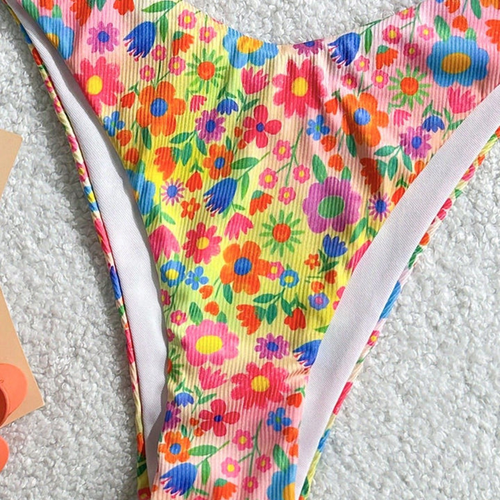 Women's triangle bikini with colorful floral design and fine ruffle details Mune Fashion