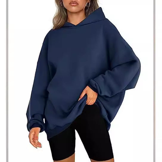 Women's oversized hoodie in longline cut with raglan sleeves and soft inner lining Mune Fashion