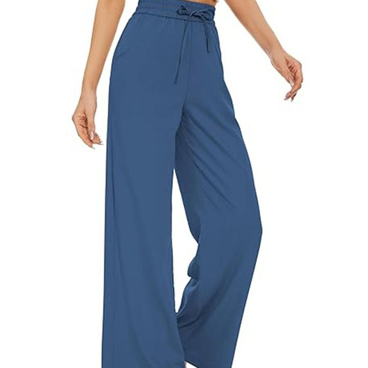 Women's wide linen pants with high elastic waistband, drawstring, and side pockets Mune Fashion
