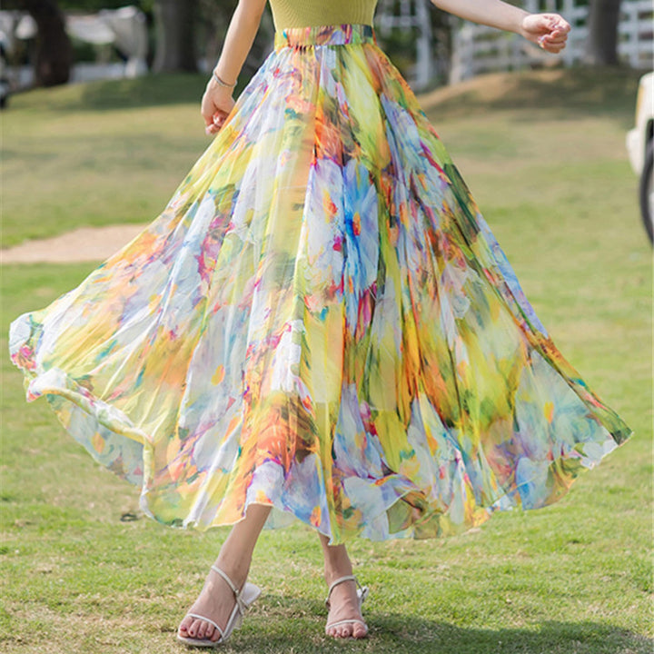 Women long pleated maxi skirt with floral summer print and elastic waistband Mune Fashion