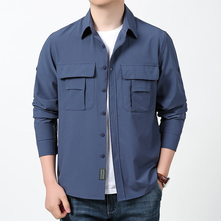 Men's lightweight field shirt with concealed button placket, two patch breast pockets and roll-up sleeves.