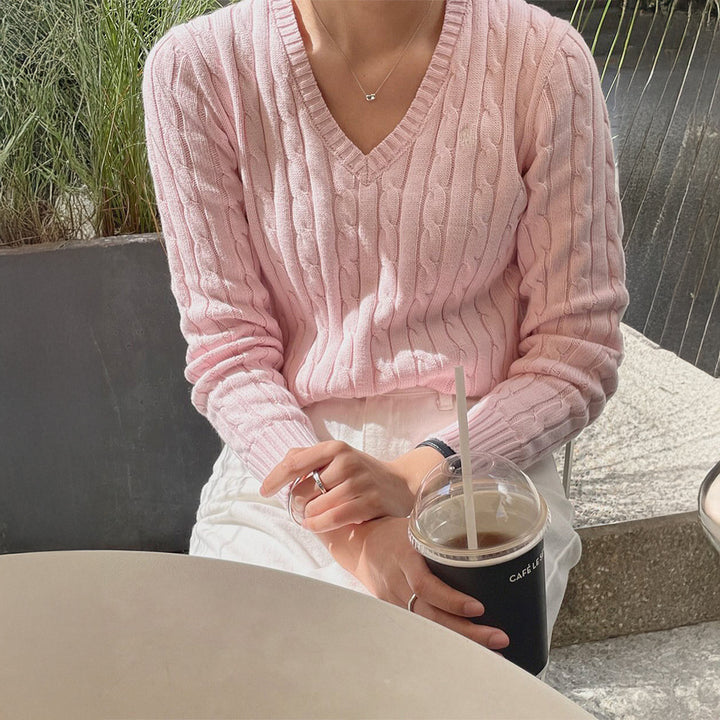 Women's fine textured knit sweater with V-neck, cable pattern and ribbed hem Mune Fashion