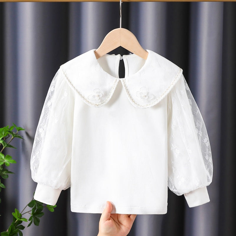 Women's blouse with decorative floral appliqués and transparent puff sleeves Mune Fashion
