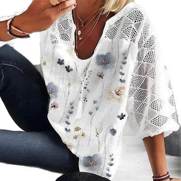 Women's V-neck tunic with lace-knit sleeves and subtle watercolor floral print Mune Fashion