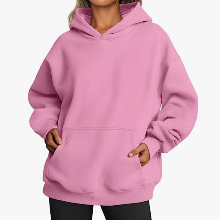 Women's oversized hoodie with extended back, fleecy interior, and kangaroo pocket Mune Fashion