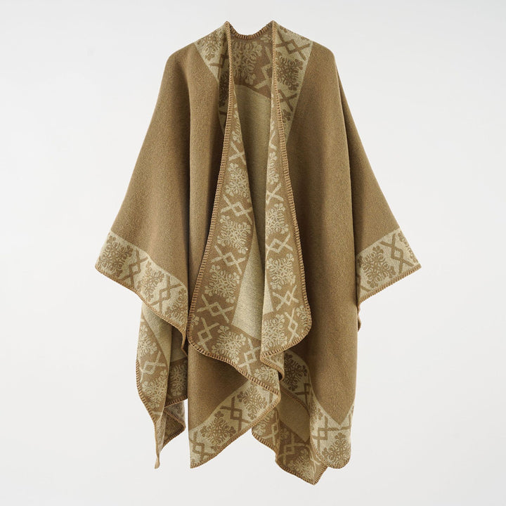 Women's oversized poncho cape made of wool blend with woven border jacquard and decorative chain stitch