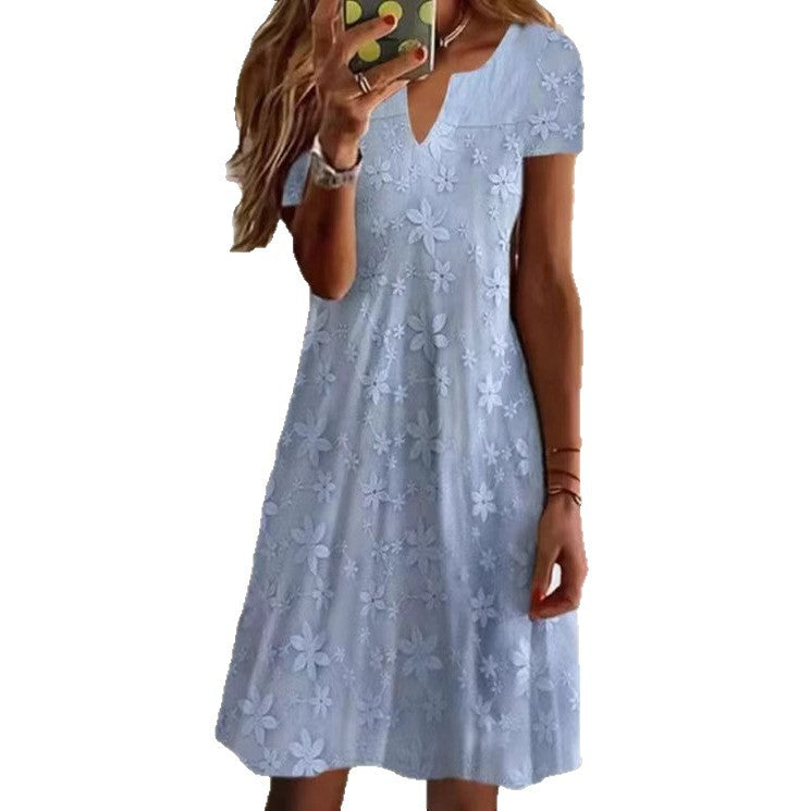 Women's knee-length A-line dress made of cotton blend with embroidered broderie overlay, short sleeves and V-neck Mune Fashion