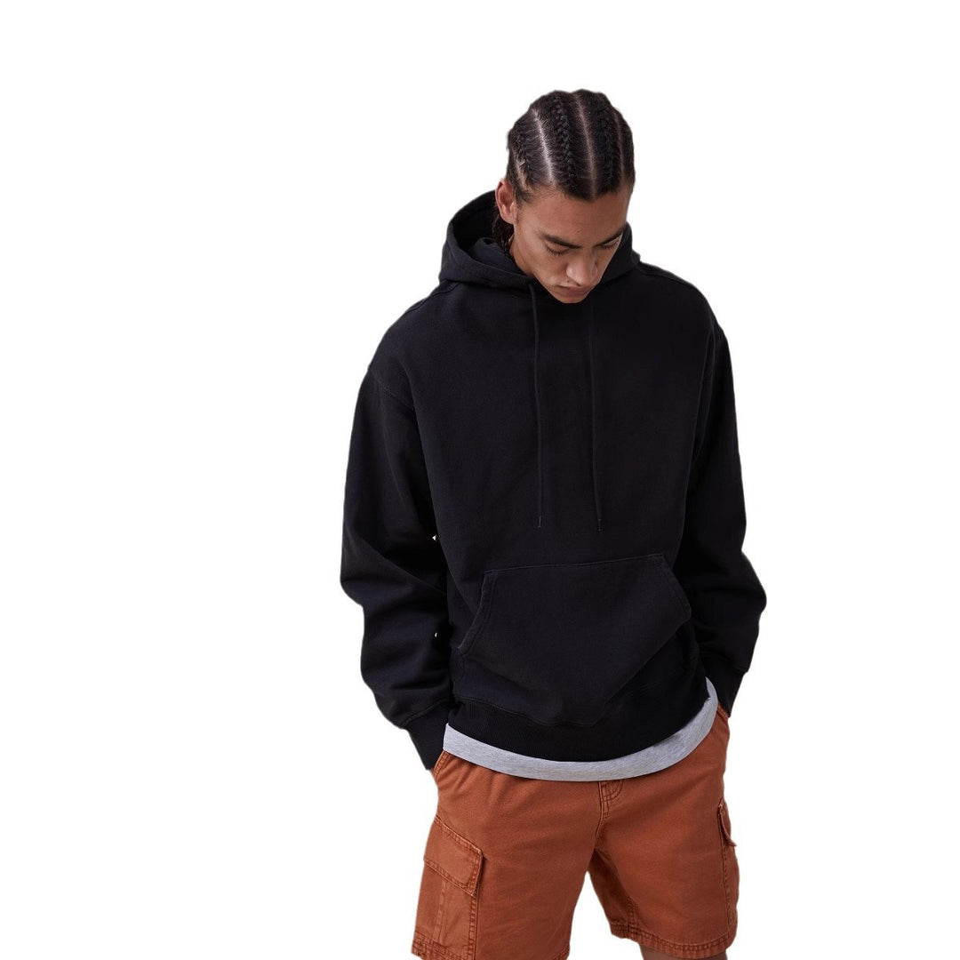 Women’s oversized hoodie dress with kangaroo pocket, extended silhouette and soft French terry Mune Fashion