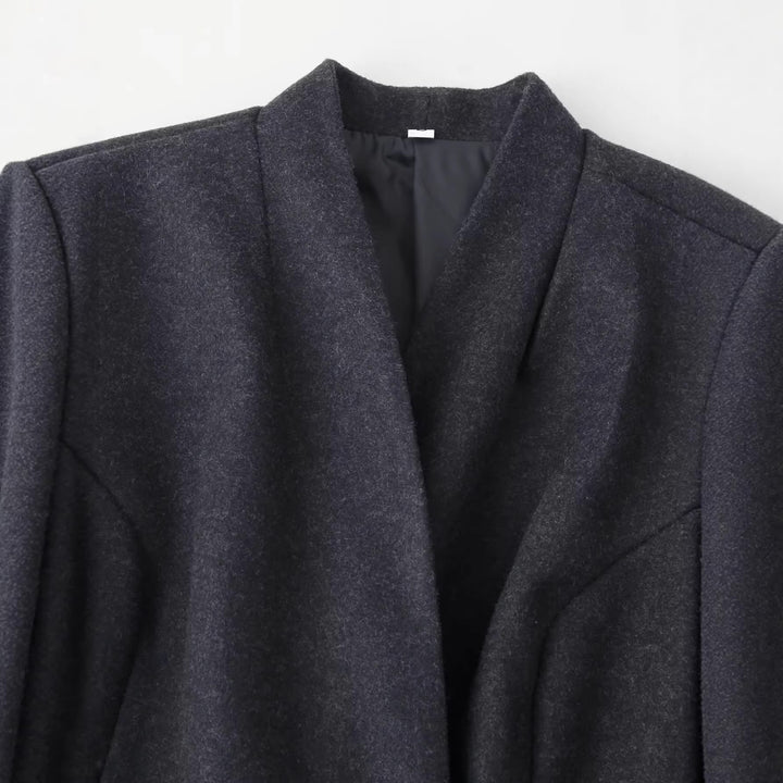 Women's elegant long-cut coat with shawl collar, tailored princess seams, and concealed single-button front Mune Fashion