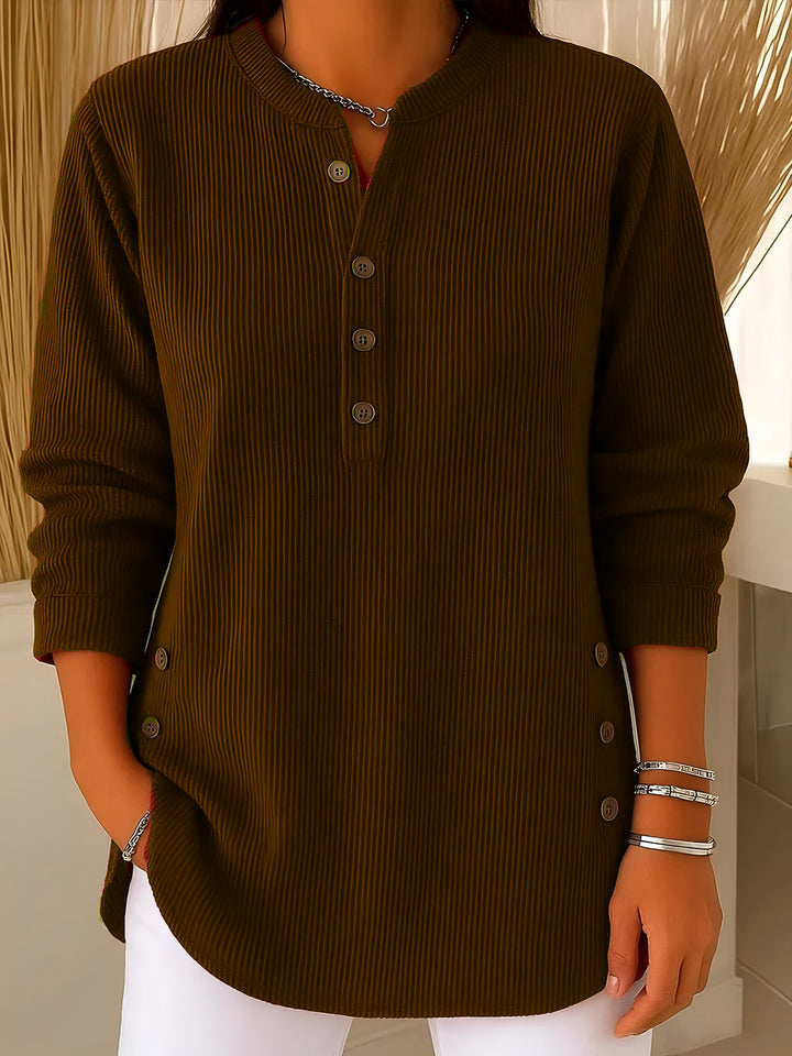 Women's plisse tunic blouse with stand-up collar, button placket and side decorative buttons Mune Fashion