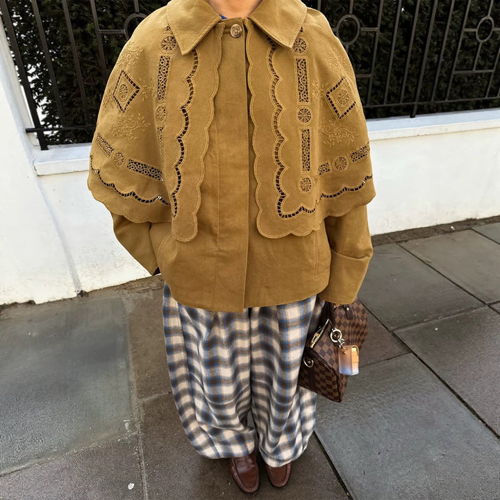 Women's short jacket with embroidered cape, eyelet embroidery and curved hem Mune Fashion