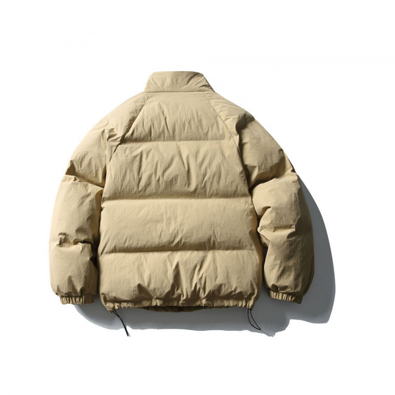 Unisex Boxy padded stand collar puffer jacket with drawstring hem and flap pockets Mune Fashion