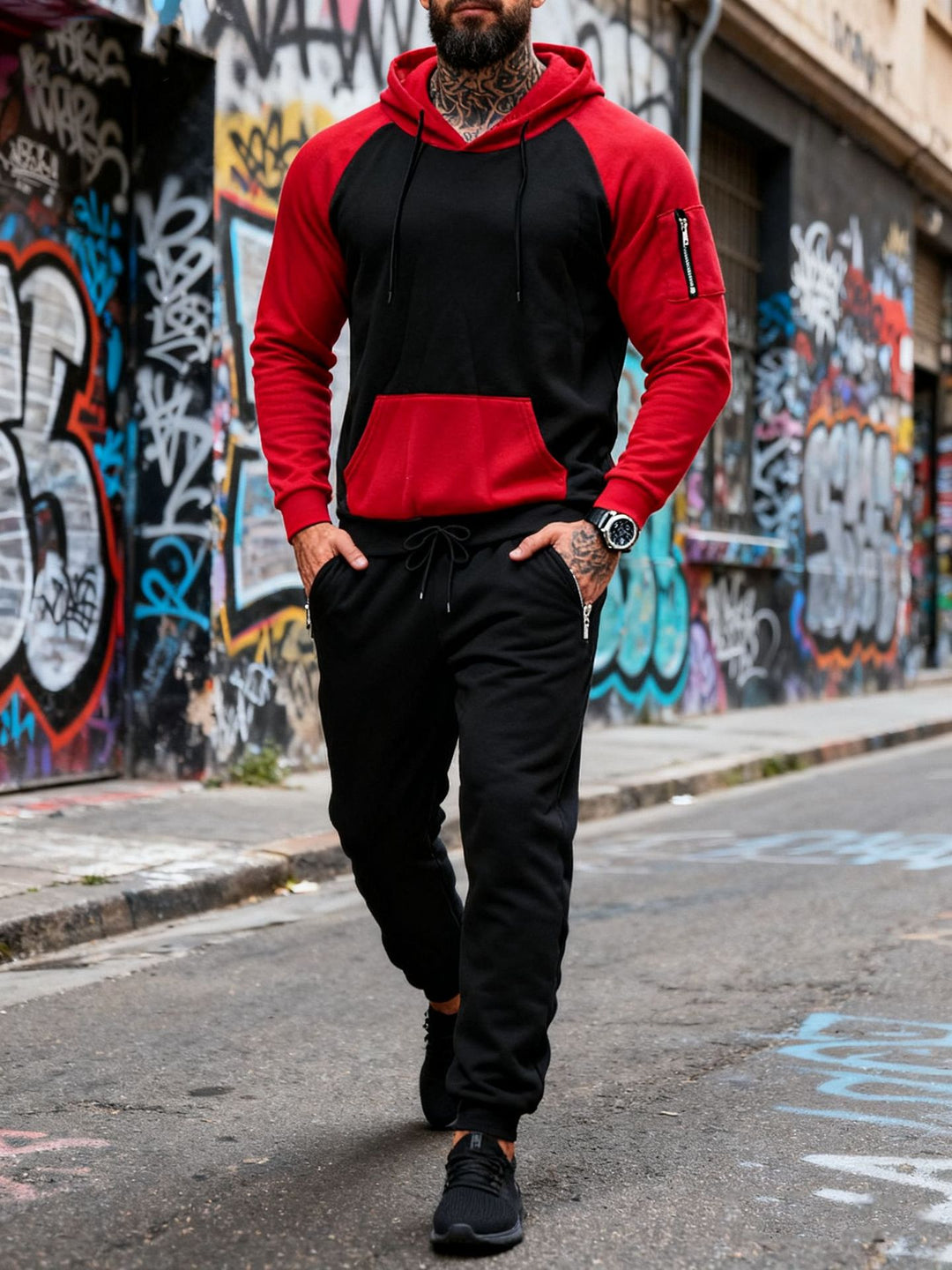 Men's two-piece hooded sweat set with raglan sleeves, sleeve zip pocket, and tapered jogging pants Mune Fashion