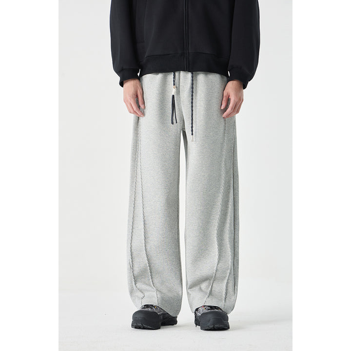 Women's Wide High-Waist Jogging Pants with Decorative Seams and Drawstring Mune Fashion