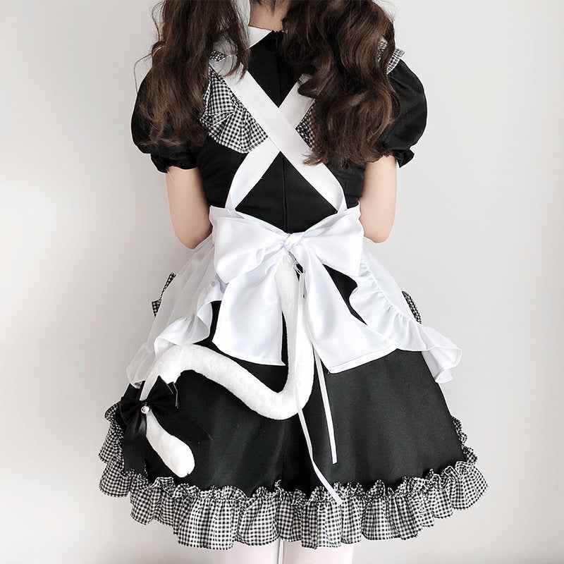 Ladies playful maid dress with ruffle details and bows Mune Fashion