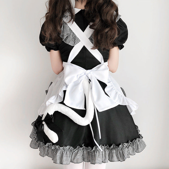 Ladies playful maid dress with ruffle details and bows Mune Fashion