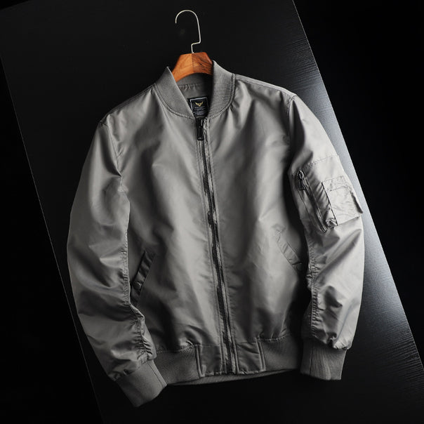 Men's windproof nylon bomber jacket in MA-1 style with arm pocket and ribbed cuffs Mune Fashion