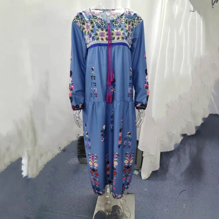 Ladies embroidered maxi dress with long sleeves, tassel closure and folkloric embroidery Mune Fashion