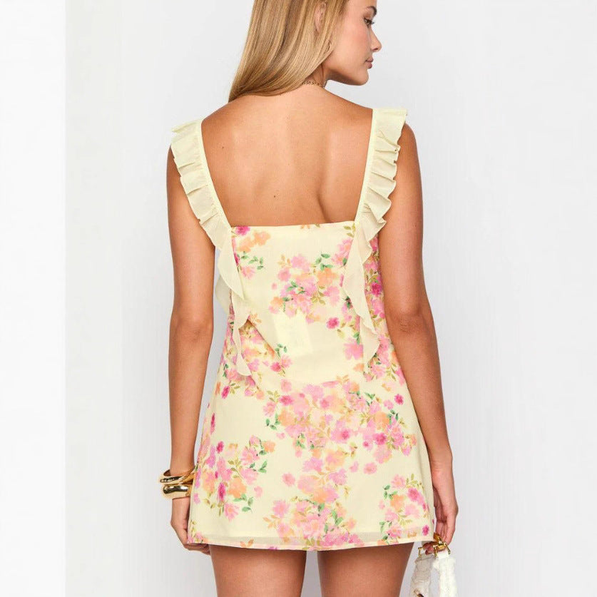 Ladies' tailored mini dress with ruffled straps, bow detail at the décolletage and floral pattern Mune Fashion