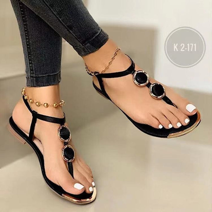 Women's elegant T-strap sandal with multi-part medallion application and adjustable ankle strap Mune Fashion
