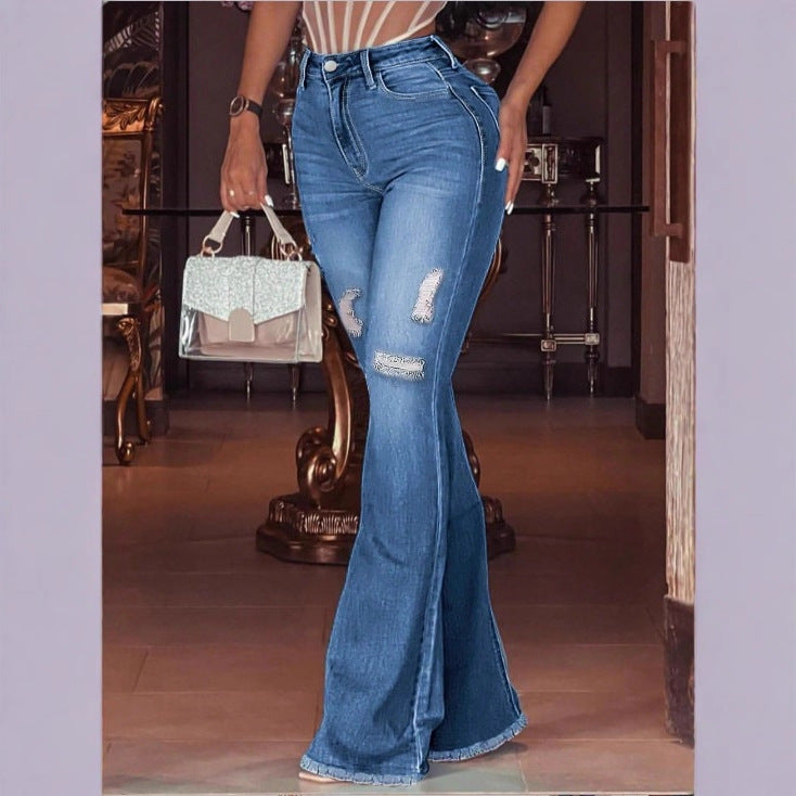Women high-waisted flared trousers made of stretch denim with flared leg, knee rips, and frayed hem Mune Fashion