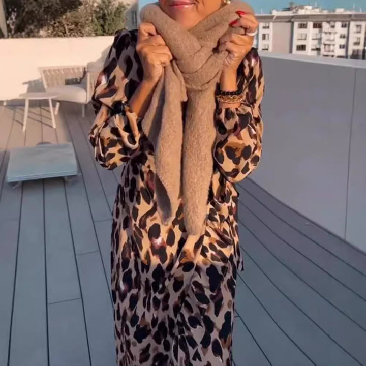 Women’s wrap midi dress with animal print, V-neck, waist belt, and asymmetrical ruffle Mune Fashion